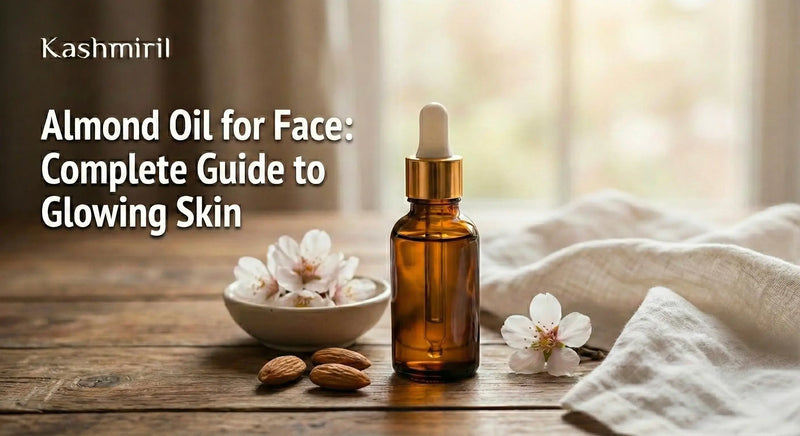 Almond oil for face in amber dropper bottle with raw almonds and almond blossoms on wooden surface - complete guide to glowing skin by Kashmiril