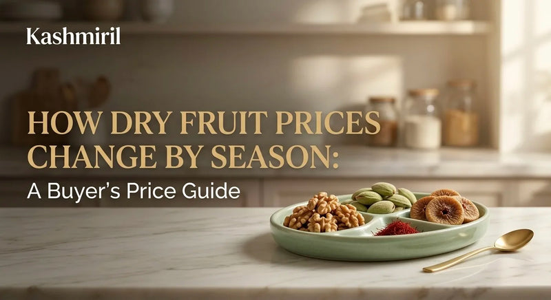 Kashmiril - HOW DRY FRUIT PRICES CHANGE BY SEASON: A Buyer’s Price Guide. Sectioned plate with walnuts, pistachios, figs, saffron and golden spoon on marble.