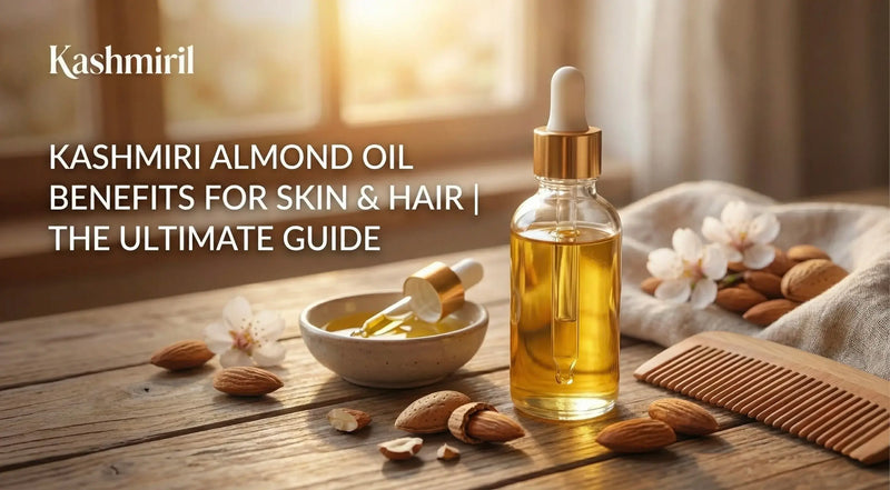 Bottle of Kashmiri almond oil with a dropper on a wooden table, surrounded by almonds and flowers, with text about its benefits written as "Kashmiri Almonds Oil Benefits For Skin &.Hair | The Ultimate Guide"