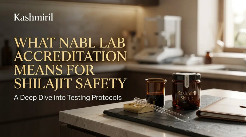 Kashmiril - WHAT NABL LAB ACCREDITATION MEANS FOR SHILAJIT SAFETY. Kashmiri Shilajit jar with lab glassware, dropper, and notebook on slate in modern kitchen setting.