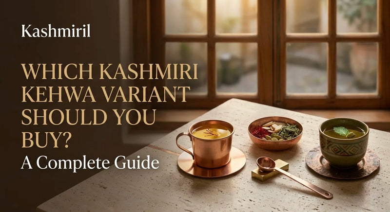 Kashmiril - WHICH KASHMIRI KEHWA VARIANT SHOULD YOU BUY? A Complete Guide. Copper cup and ceramic bowl of kehwa with saffron, almonds, and mint on marble table near sunlit window.