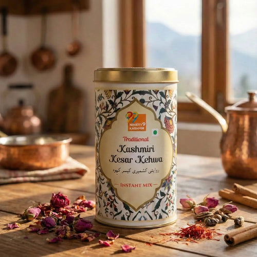 Kashmiril Kashmiri Kesar Kehwa instant mix can with a glass of tea and saffron on a beige background