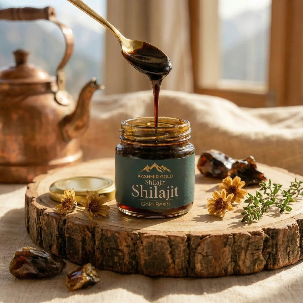 Jar of Shilajit with a spoon pouring resin, surrounded by natural elements on a wooden surface.