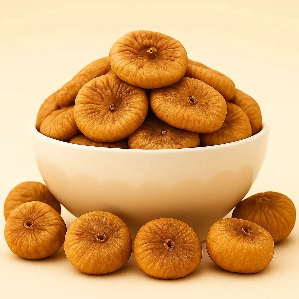 White bowl filled with dried figs on a beige background