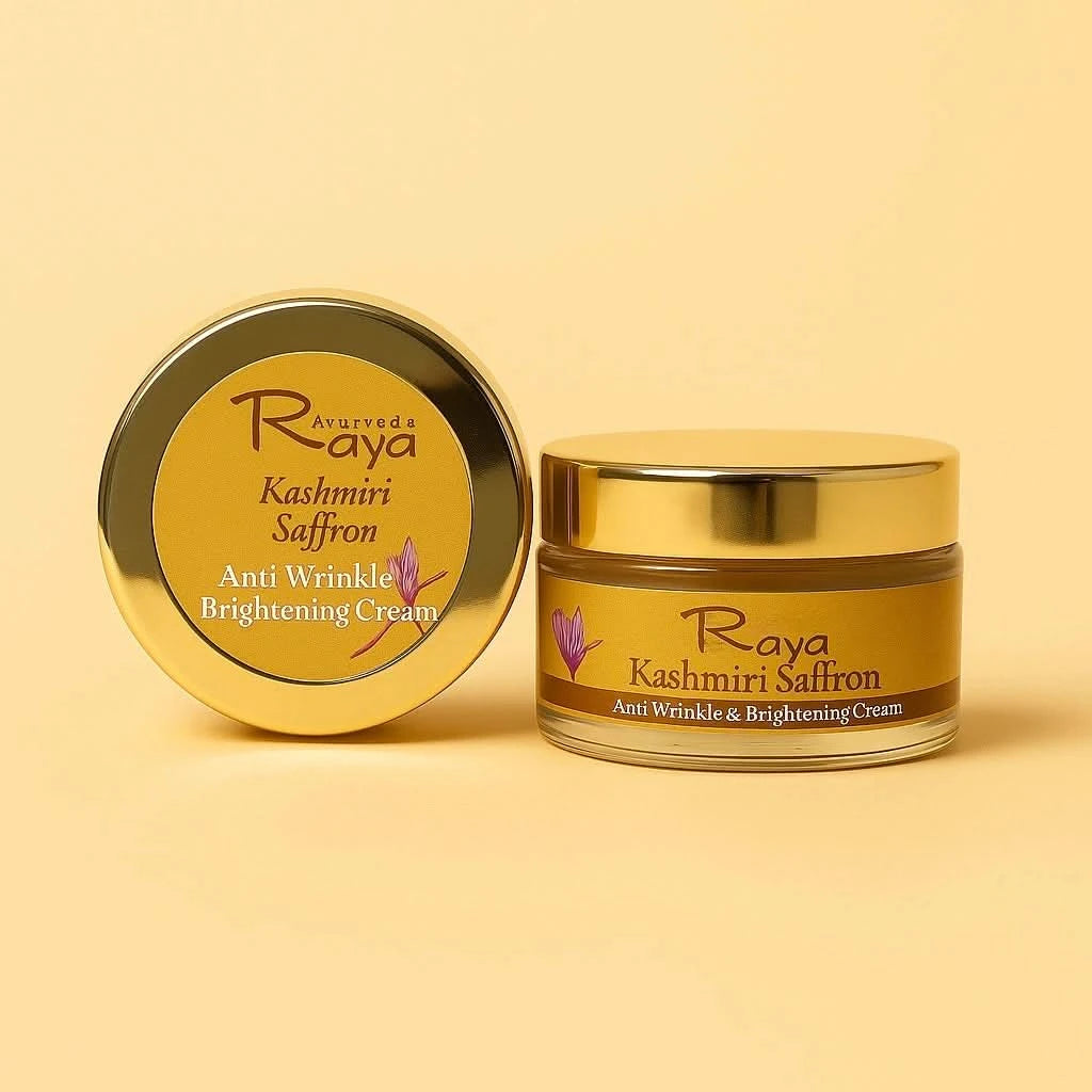 Raya Kashmiri Saffron Anti Wrinkle Brightening Cream jar and lid on a beige background